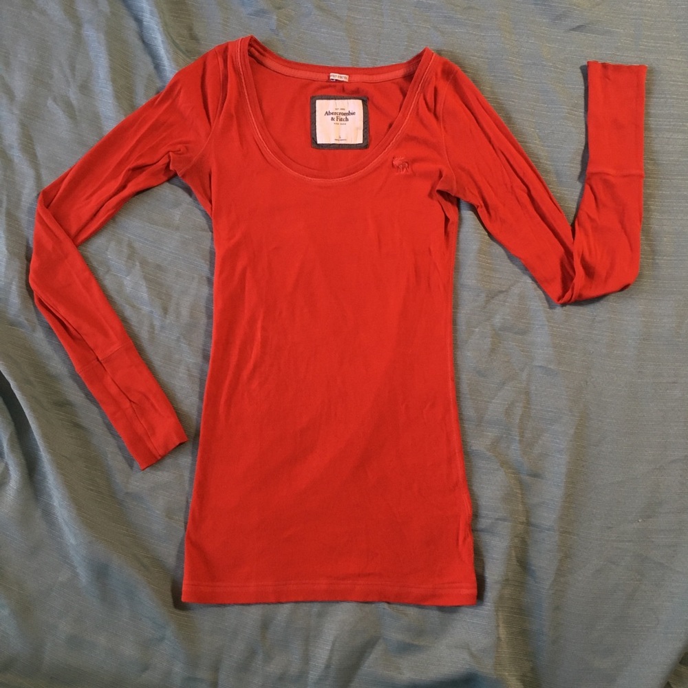 Red long sleeved shirt.
